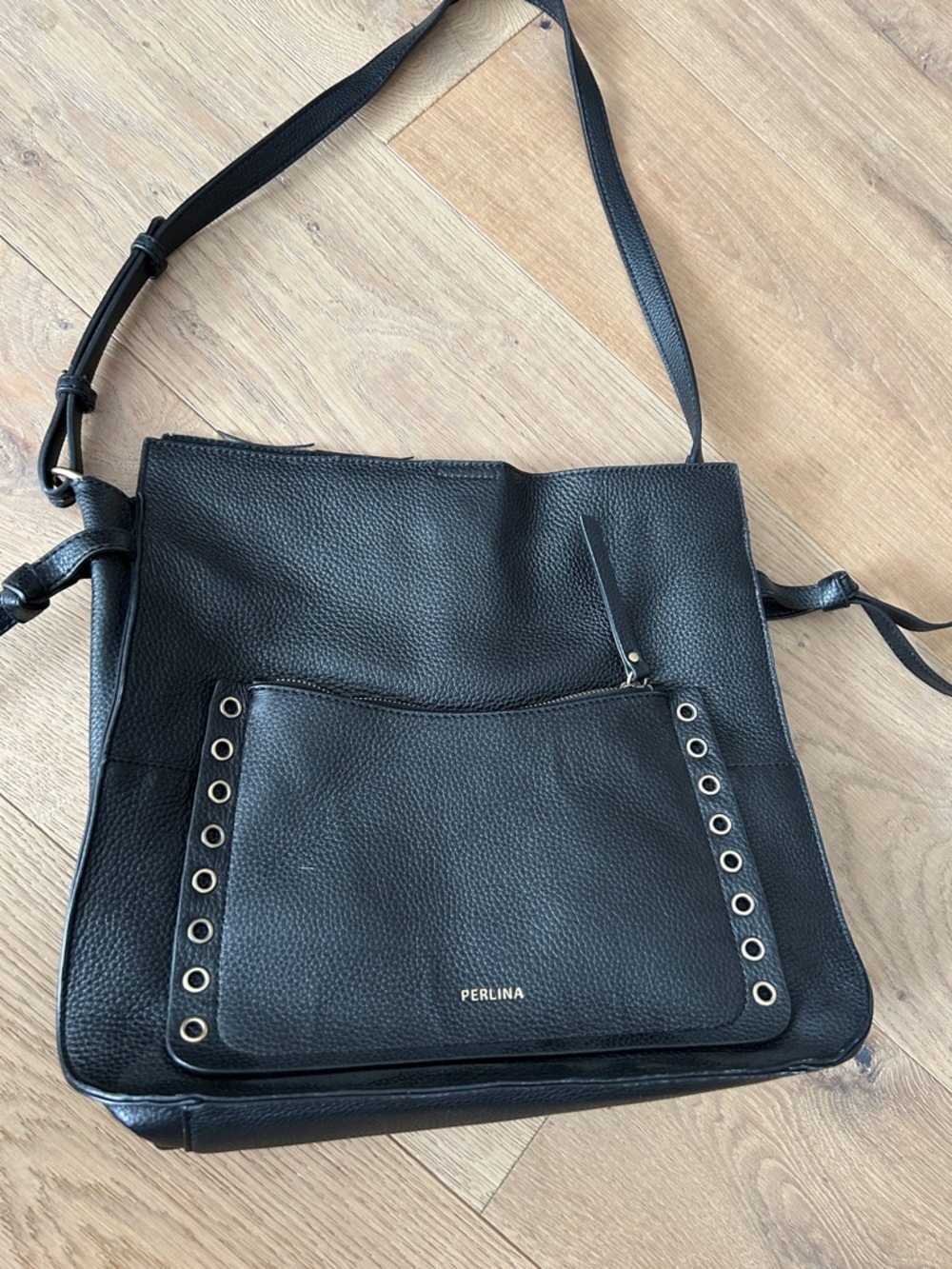 Perlina Black Pebbled Leather Crossbody with Eyelet Front Pocket
